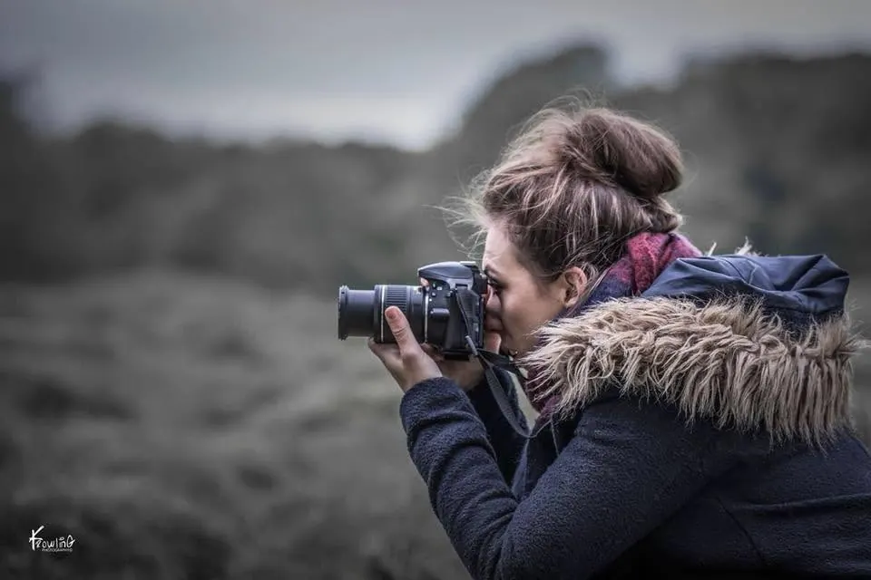 Laura Barrett with a young subject during a photoshoot